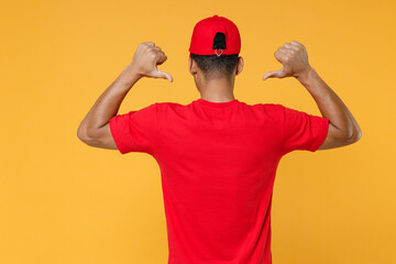 Delivery employee african man in red cap blank tshirt uniform workwear work courier service on...