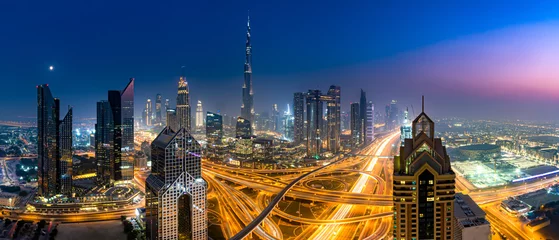 Foto op Canvas Dubai Skylinen at dusk © Remco