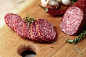 Salami on a cutting board.