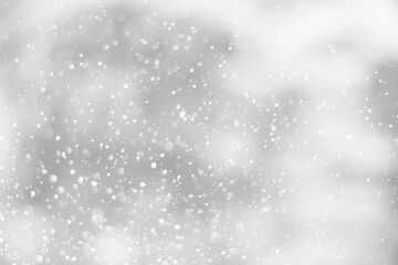 White glitter vintage lights background. White bokeh background.