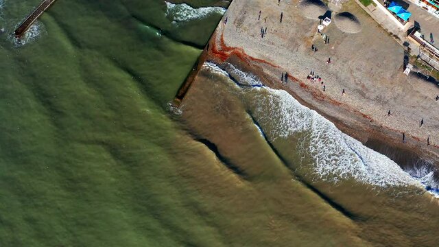 Black Sea aerial. Aerial view of the Black Sea coast and famous Russian surf spot named Khosta Rica in the mouth of the river of Khosta.