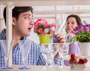 Young family shopping in shop