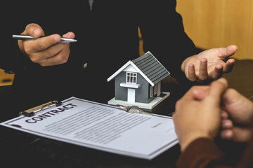 Real Estate concept. Lessors and landlords are discussing real estate leasing details.