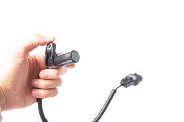 car engine crankshaft position sensor on isolated white background.