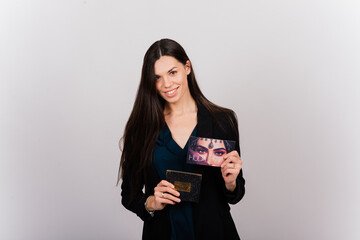 Cosmetologist beautician holding a tool in her hands, permanent makeup master, permanent makeup