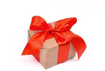 Bright Christmas, New Year, Valentine's present, made of craft paper with red ribbon, isolated on white background