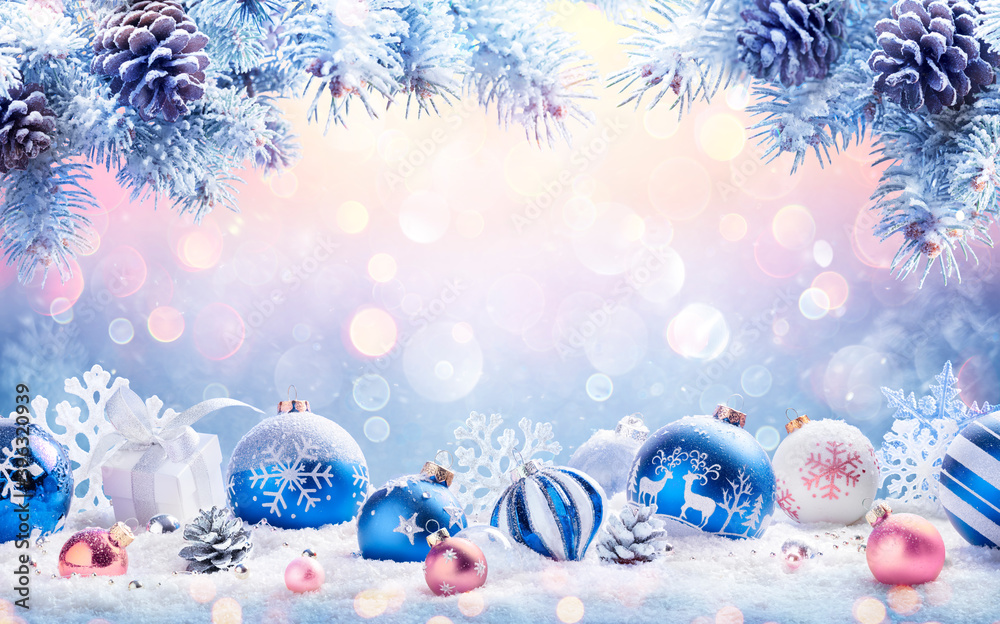 Canvas Prints abstract christmas card - baubles on snow with fir branches and defocused snowfall in background