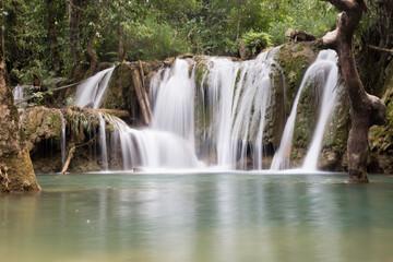 Tat Sae Waterfall Laos beautiful tourist attraction with flowing water in jungle