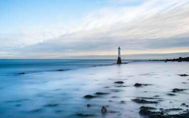 Long time exposure of Lighthouse in High Tide in Shaldon in Devon in England, UK, Europe