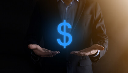 Successful international financial symbol sinvestment concept with businessman man person hold showing growth, charts and dollar sign, digital technology