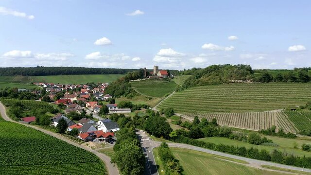 Drone shot of Neipperg Castle with vineyards, Germany