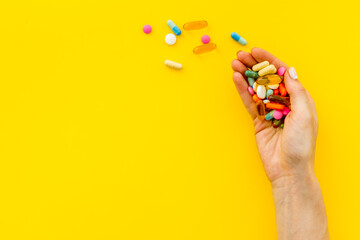 Medical capsule pills in hands top view