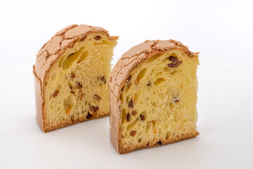 Panettone, classic Christmas cake from Milan, two slices isolated on white