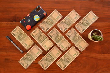 Indian Rupees Laid out on a Table