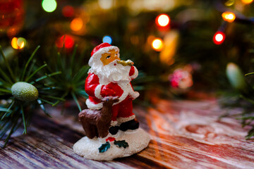 Christmas decorations with santa in the branches