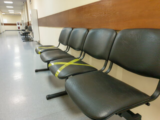Alternative seating mark for social distance rules in hallway, distance for one seat from other people to protect from Corona Virus(COVID-19), social distancing for infection risk.New normal lifestyle