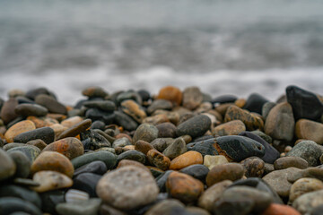 wet stones on the beach seashore
