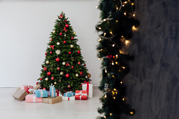 Fototapeta na wymiar Christmas Interior Christmas Tree Presents New Year as a backdrop