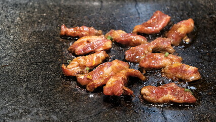 close up Korean bulgogi on slate. Traditional Korean barbecue.