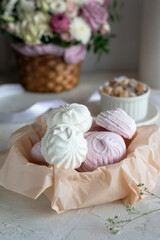 Fototapeta na wymiar Homemade colored marshmallow in a basket