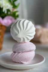Homemade white and pink zephyr on a plate