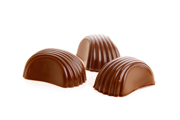 three chocolates isolated macro
