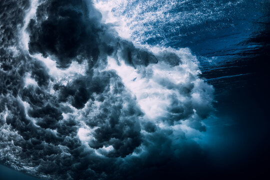 Underwater ocean wave with foam and bubbles © artifirsov