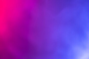 Colorful smoke on dark background.Abstract pink and blue blurred background.