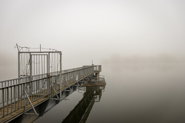 Foggy autumn morning at Lake Gebart in City Zalaegerszeg, Hungary