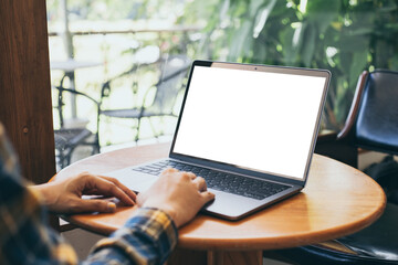 computer blank screen mockup.hand woman work using laptop with white background for...