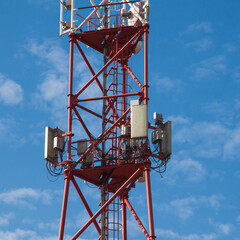 A cell phone tower 4G 5G. Internet connection with a blue sky on the background