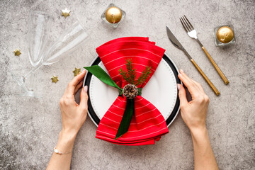 Christmas dinner concept with empty plate and glasses. Top view, flat lay