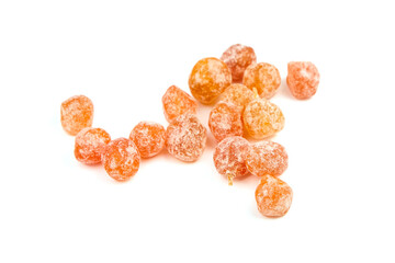 Dried kumquats, heap of candied fruits isolated on white