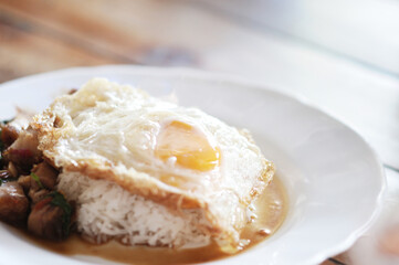 Fried eggs that are cooked in the dish.