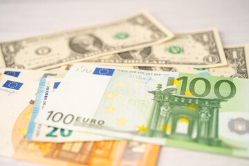 Obraz na płótnie Canvas US dollar and Euro banknotes background; Banking Account, Investment Analytic research data economy, trading, Business company concept.