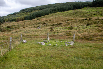 Knocknakilla stone circle situated between Macroom and Millstreet, in County Cork, Ireland. It is set in blanket peatland on the north-west upper slopes of Musherabeg mountain a