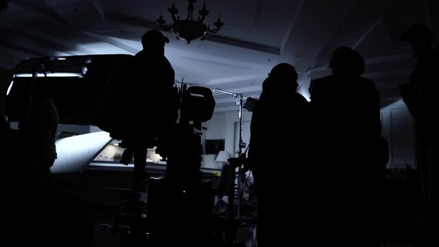 film crew in cummercial film set.