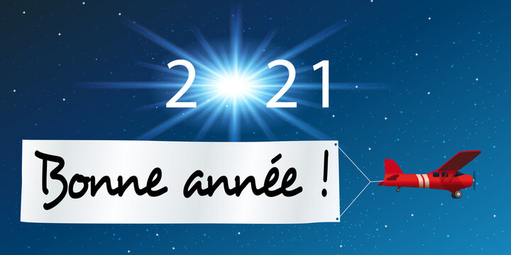 Carte de v&oelig;ux 2021 montrant un avion rouge tirant une banderole blanche pour souhaiter la bonne ann&eacute;e, devant un ciel &eacute;toil&eacute;.