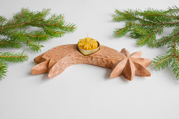 Christmas decoration 
carved from linden wood. Handmade carved wooden star and comet. Beeswax candles.