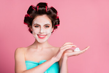 Close-up portrait of lovely cheerful housewife holding on palm applying soapy mousse pore clear...