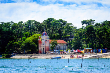 Algerian church in the blue sea in front of the sand dune in Bassin d'arcachon