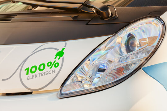 Front close up of an electric car with the Dutch text '100% Electric' in Venlo, The Netherlands on October 1, 2012