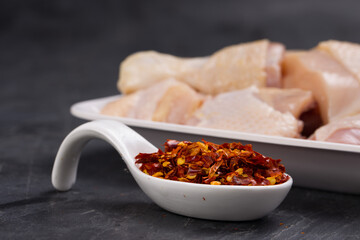 Raw chicken tender curry cut with skin