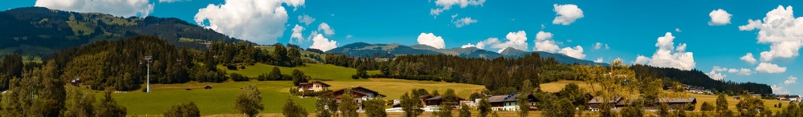 High resolution stitched panorama of a beautiful alpine summer view at the famous Panoramabahn...