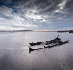 panoramic landscape image of mudflat in essex england