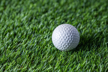 Golf ball on green grass