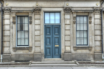 Fototapeta na wymiar doorway and windows of Victoria Hall city hall Cobourg Ontario Canada