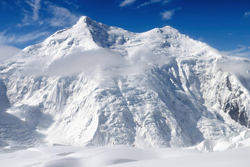 Obraz premium High mountain landscape. View of Tengri Tau Range from Marble Wall slope. Central Tian Shan, Kazakhstan - Kyrgyzstan - China.