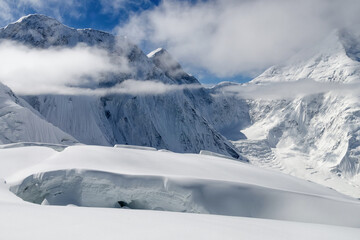 Glacier crack on the background of Tengri Tau Range. Central Tian Shan, Kazakhstan - Kyrgyzstan - China.