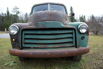 Front grill of old rusty truck